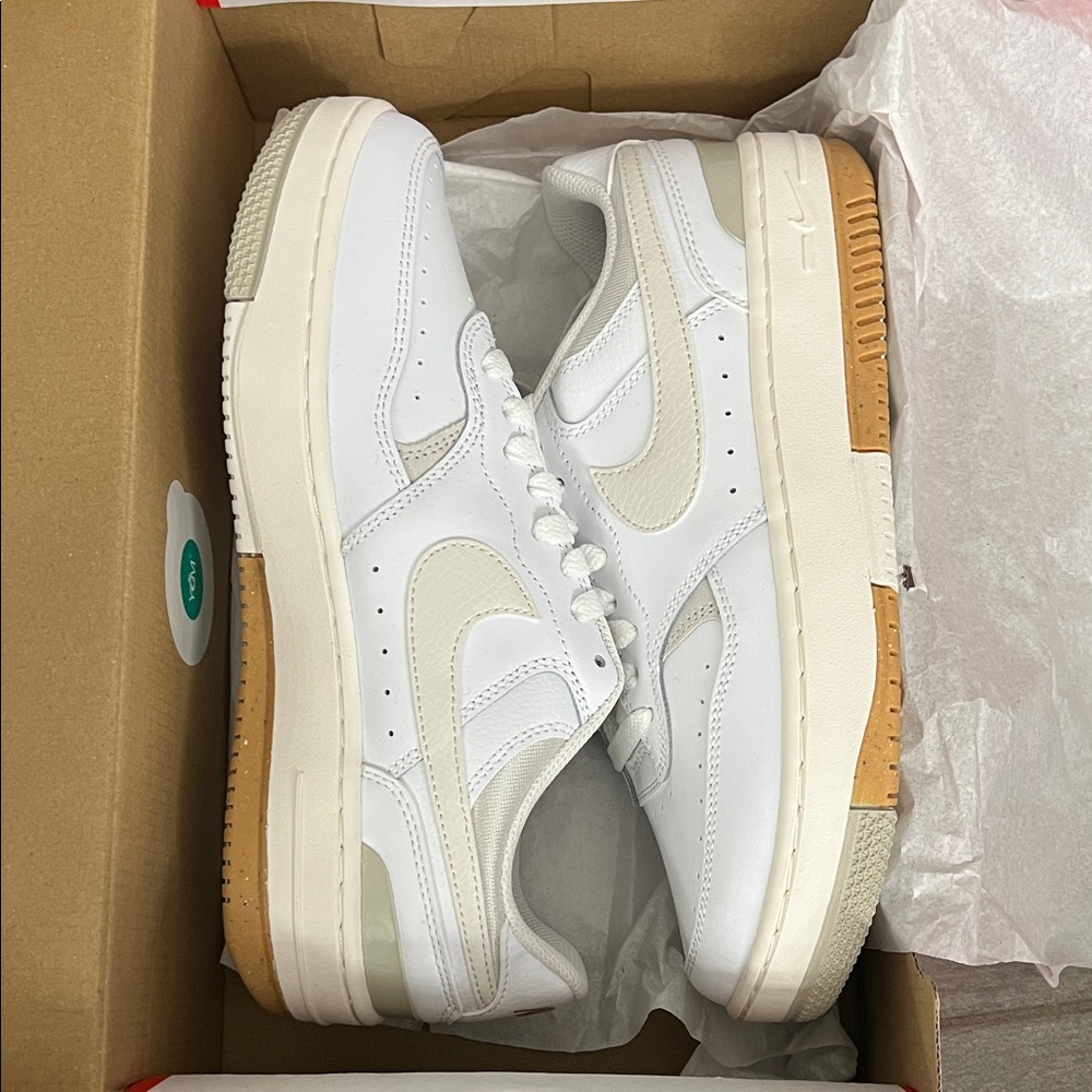 Nike Women’s White and Cream Sneakers